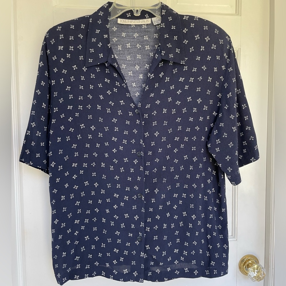 Navy blue with white flower or butterfly shapes shirt by Josephine Chaus size 14